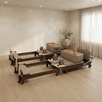 Reformer de Pilates pliable en bois pour usage domestique avec glissières ultra-silencieuses, vente en gros