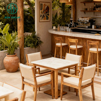 Ensemble de meubles de jardin modernes pour terrasse, salon de thé ou café, avec tabourets de bar hauts en bois et cuir, et table et chaises d'extérieur, pour usage commercial