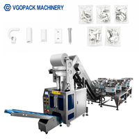 Machine d'emballage automatique à 7 vibro-alimentateurs pour kits de quincaillerie murale, avec élévateur, pour l'emballage en sachets