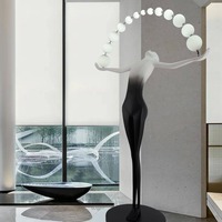 Lampadaire LED de style nordique artistique, sculpture humanoïde, pièce de designer pour hôtels, bureaux de vente, salles d'exposition, figurine humaine
