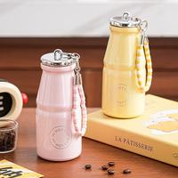 Nouvelle gourde isotherme portable en acier inoxydable pour enfants, mignonne tasse à lait pour enfants avec corde, cadeau idéal pour filles