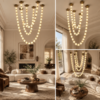 Lustre moderne de luxe en albâtre à anneaux multiples, cadre en laiton, couleur personnalisée pour hall d'hôtel, escalier, plafond haut, projet d'aménagement intérieur