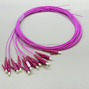 Pigtail de Fibra Óptica OM4 Magenta LSZH de Alta Precisión y Baja Pérdida, Conector LC UPC para Empalme en Gabinete ODF - Product Image 5