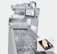 Machine d'emballage automatique de fromage électrique avec fonctions de thermoformage et de remplissage sous vide