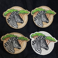Patch de la faune de la Maasai Mara |   Broderie zébrée détaillée |   Autocollants thermocollants pour vestes, chapeaux et sacs