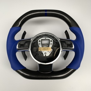 CCE Volant en fibre de carbone Offre Spéciale pour <span class=keywords><strong>Audi</strong></span> 2008 <span class=keywords><strong>TT</strong></span> R8 Anneau <span class=keywords><strong>rouge</strong></span> en cuir perforé Accessoire de voiture - Product Image 2