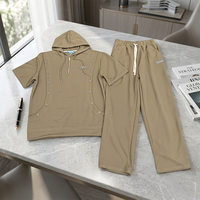 Ensemble 2 pièces décontracté pour homme : sweat à capuche mi-zippé à clous et manches courtes en tricot thermique imprimé, et pantalon taille élastique – Collection automne