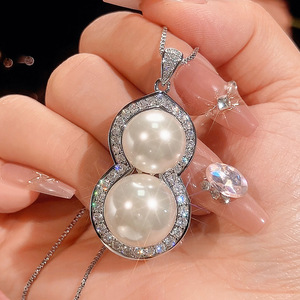 Nouveauté 2026 : Collier pendentif gourde en cuivre plaqué or avec perle simulée pour femme, 16-14 mm - Product Image 2