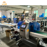 Machine d'emballage horizontale automatique pour l'emballage de produits alimentaires, de collations, de pain et de savon