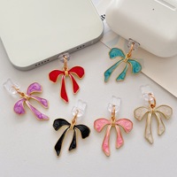 Breloques anti-poussière pour téléphone avec nœud mignon, pendentifs décoratifs en émail en forme de nœud pour port de charge USB-C, accessoires décoratifs