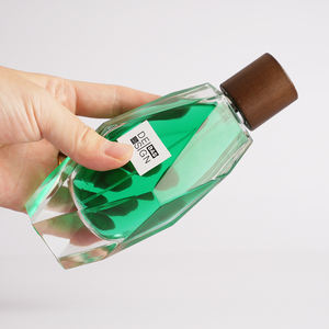 Production en gros <span class=keywords><strong>de</strong></span> flacons <span class=keywords><strong>de</strong></span> parfum en verre vides <span class=keywords><strong>de</strong></span> 100 ml, couleur personnalisée, artistiques, avec couvercle en bois, pour les lignes <span class=keywords><strong>de</strong></span> parfums <span class=keywords><strong>de</strong></span> niche - Product Image 1