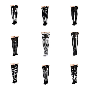 Calcetines hasta la rodilla con estampado de Halloween para mujer, accesorios de disfraz con diseño de telaraña, cruz, murciélago y calavera en blanco y negro - Product Image 1