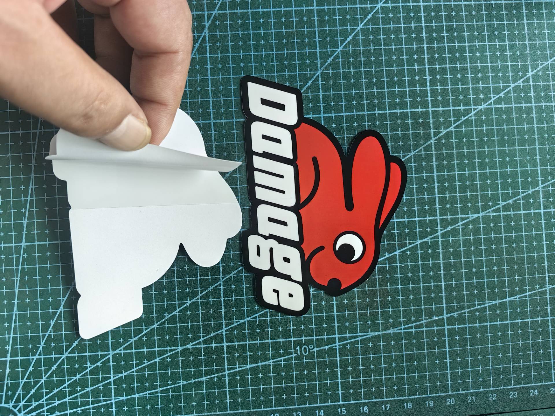 Die cut individual sticker with crack cutting on the back