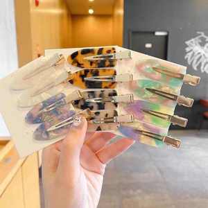 Horquillas de acetato sin rastro de colores nuevos al por mayor, pinza de pelo de PC de aleación de metal plana personalizada a la moda para niñas, tabla de colores - Product Image 5