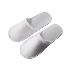 Pantuflas blancas desechables con logotipo personalizado El Hotel es conveniente para llevar zapatillas de siesta con suela de EVA