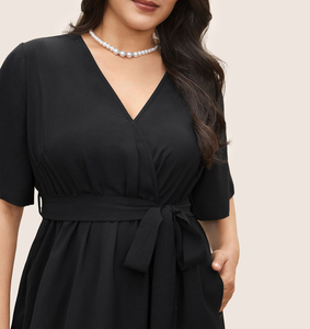 Venta al por mayor de gran tamaño de las mujeres Midi vestido negro sólido patrón alto bajo Streetwear volantes fajas decoración hecha sostenible Spandex - Product Image 5