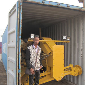 รถเกรดเดอร์ CAT 12H บรรทุกในตู้คอนเทนเนอร์ รถเกรดเดอร์ก่อสร้างถนน Caterpillar 12H ในตู้คอนเทนเนอร์ - Product Image 1