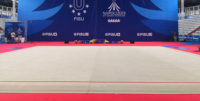 Type de compétition Gymnastique rythmique Sol d'exercice Plancher d'achèvement (type à ressort) Gymnastique rythmique 14.5m * 14.5m pour l'exportation