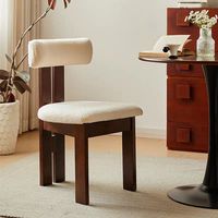 Table à manger ovale blanche moderne et durable avec base noire et ensemble de 6 chaises assorties pour une conception de cuisine minimaliste L041