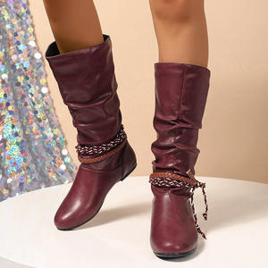 รองเท้าบูทผู้หญิงแบบถักเปีย แต่งระบาย ปลายมน ส้นแบน ความยาวครึ่งน่อง ดีไซน์เฉพาะตัว สวมใส่สบาย ใช้งานได้หลากหลาย เหมาะสำหรับเดินทาง ปาร์ตี้ วันหยุด และแฟชั่น - Product Image 1