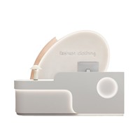 Comptoir de réception pour salon de beauté avec éclairage LED, design moderne et épuré, finition peinture cuite durable pour magasins de détail