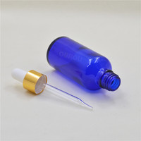 Mattierte Blaue Glasfläschchen mit Siebdruck-Etiketten & Goldprägung für Kosmetik-Körperöl-Verpackungen