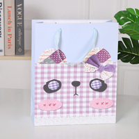 Customized Wholesale Classic Recycled Paperboard Craft Gift Packaging Bags Cute Animal Christmas Pattern Offset Printed Ribbon