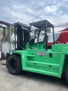 Montacargas Diésel Usado de 15 Toneladas, Tracción 4x4, Modelo FD150, Mástil de Dos Etapas, Neumáticos para Terreno Accidentado, Cabina Verde - Product Image 4