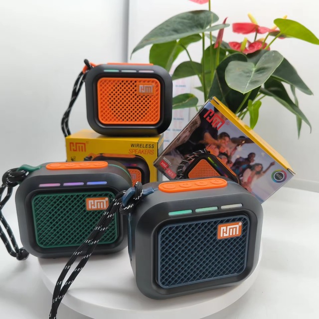 Factory Direct HM-823 Portable Bluetooth Speaker RGB LED Light FM Radio TF USB Mini Wireless Speaker for Wholesale Custom Logo