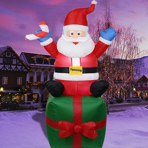 Figura Inflable Luminosa <span class=keywords><strong>de</strong></span> Papá Noel con LED <span class=keywords><strong>de</strong></span> 1.8 Metros, Modelo <span class=keywords><strong>de</strong></span> <span class=keywords><strong>Navidad</strong></span> Sentado en Árbol Navideño con Bolsa <span class=keywords><strong>de</strong></span> Regalo <span class=keywords><strong>de</strong></span> Bienvenida y Bastón - Product Image 1