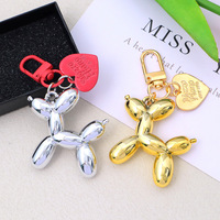 Porte-clés pendentif chien ballon couleur bonbon, étui pour écouteurs en forme de cœur peint, accessoire de sac, accessoire pour couple