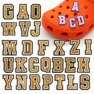 2024 Soft Hot Selling PVC New Cartoon Arrivals Pink Gold Black Red English Letter Butterfly Beautiful Croc Shoe Charms