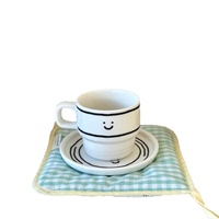 Ensemble tasse à café et soucoupe en céramique style coréen avec visage souriant mignon, tasse à cappuccino créative pour cadeau de café, vente en gros