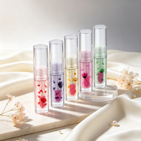 Vente en gros de rouge à lèvres liquide longue durée personnalisé à la vitamine E, brillant à lèvres hydratant aux extraits de fleurs et de plantes, huile de soin des lèvres quotidienne