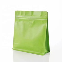 Emballage écologique en étain à fond plat, sachets d'emballage de grains de café compostables personnalisés avec valves et fermetures éclair.