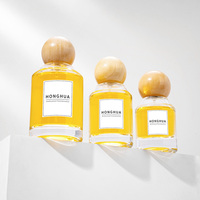 Flacon de parfum rechargeable en verre transparent 30ml 50ml 100ml avec boîte cadeau rigide ronde de luxe pour une image de marque de parfum haut de gamme