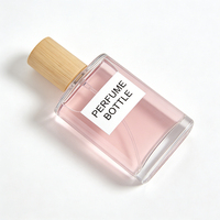 Flacon de parfum en verre transparent élégant de 50 ml avec capuchon pulvérisateur et marquage à chaud, vente en gros d'usine, haute qualité