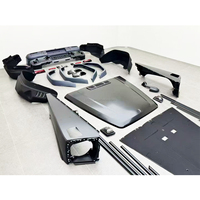 Kit carrosserie de haute qualité avec pare-chocs, calandre, capot, ailes et feux pour conversion Mercedes Classe G W463 en W465 G63, ajustement parfait à 100 %.