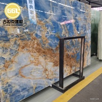Dalles de marbre bleu rétroéclairées de luxe GGL, panneaux de marbre de première qualité, dalles d'onyx polies pour la décoration d'hôtels modernes