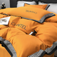Parure de lit quatre pièces en soie glacée brodée, style luxe léger, en coton polyester écologique lavé, pour l'été