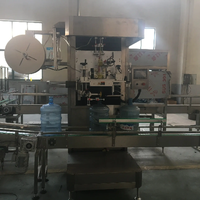 Machine d'étiquetage automatique des manchons pour bouteilles, canettes, emballages en plastique et en verre