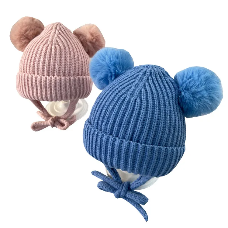 Bonnet d'hiver en tricot chaud pour bébé avec logo personnalisé de haute qualité Chapeaux pour enfants à double pompon Bonnet d'hiver en tricot