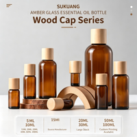 Bouteilles en verre ambré avec couvercle en bois de peuplier pour huile essentielle et sérum facial 5 ml 10 ml