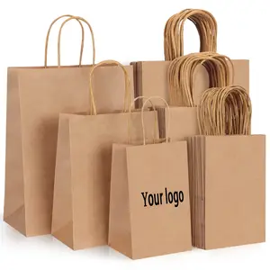 Vente en gros de papier kraft biodégradable bon marché avec poignée Sac d'emballage de magasinage de cadeaux de magasin Sac en papier cadeau personnalisé avec votre propre logo