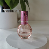 Bouteilles de pulvérisation cosmétiques 10 ml flacon pulvérisateur en verre rond en forme d'ampoule bouteille en verre coloré avec pulvérisateur à brume fine