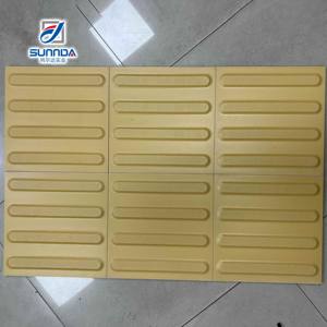 Piastrella di ceramica per esterni in porcellana per esterni per esterni a bordo rettificata di colore giallo tattile - Product Image 1