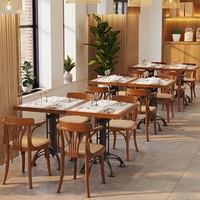 Ensemble de table à manger en ardoise avec structure métallique, style américain rétro, chaises en rotin et bois massif, mobilier de restaurant commercial de luxe
