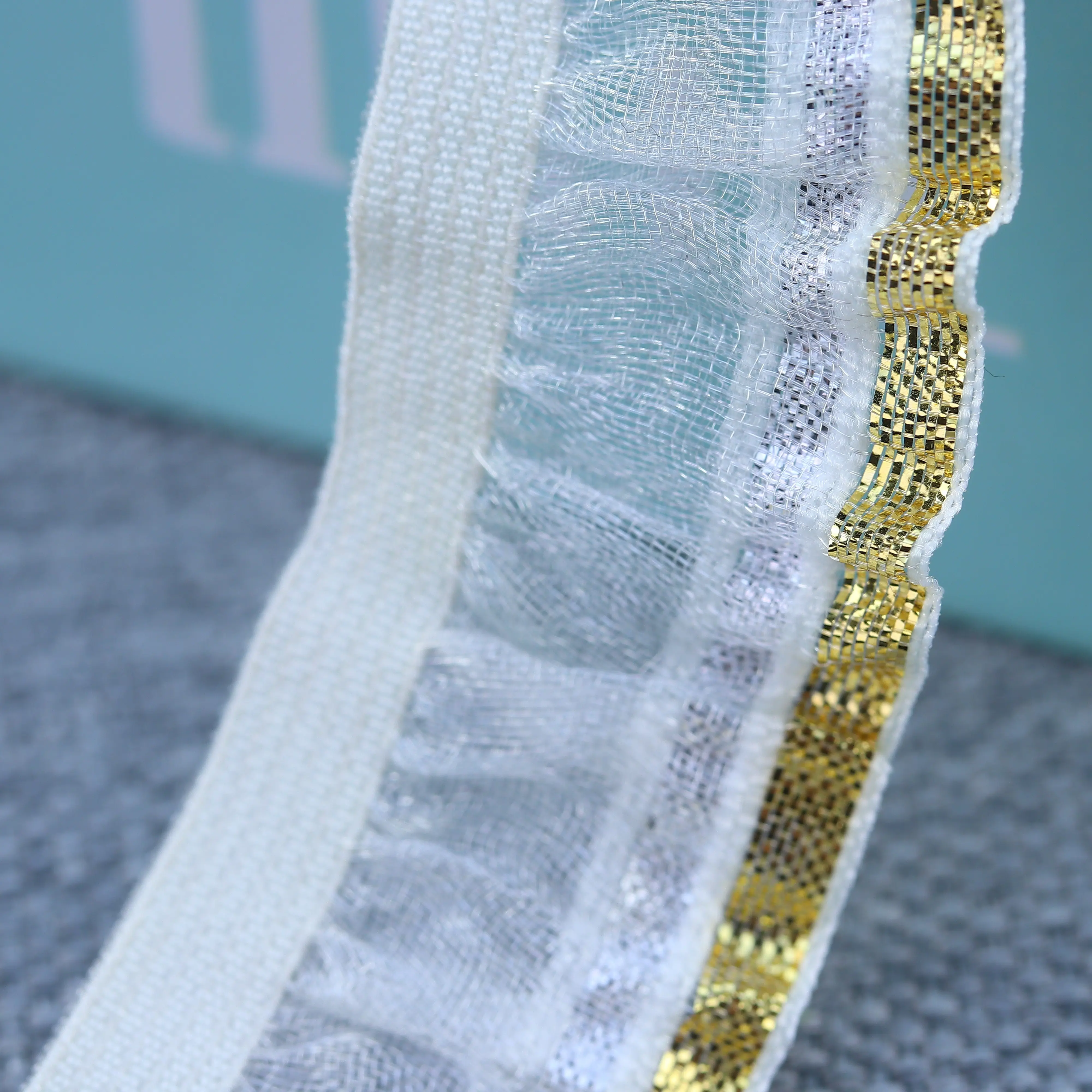 Fascia elastica per gonna di gioielli in filo d'argento con fettuccia in pizzo trasparente unidirezionale personalizzata del produttore