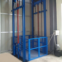 Plateforme de levage hydraulique robuste Risenmega 1t avec rail de guidage vertical pour manutention de matériaux 12m en acier au manganèse Q345B CE ISO9001