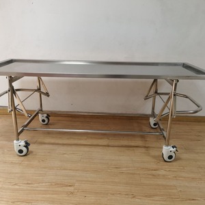Manufacturer supplies stainless steel autopsy <b>tables</b>, autopsy stations, and sampling <b>tables</b> for autopsy rooms; height - Product Image 2